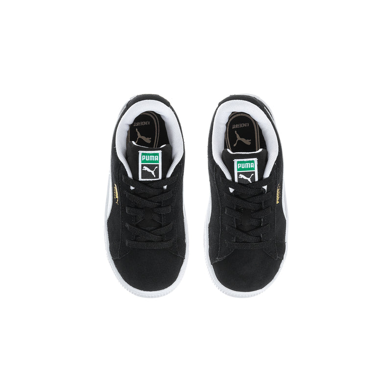 Toddler black suede sneakers, inside tongue showing PUMA label and eyelets