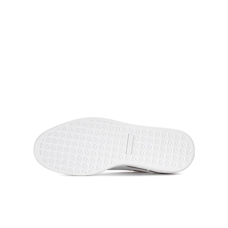 Youth suede sneakers, outsole view, textured white rubber sole