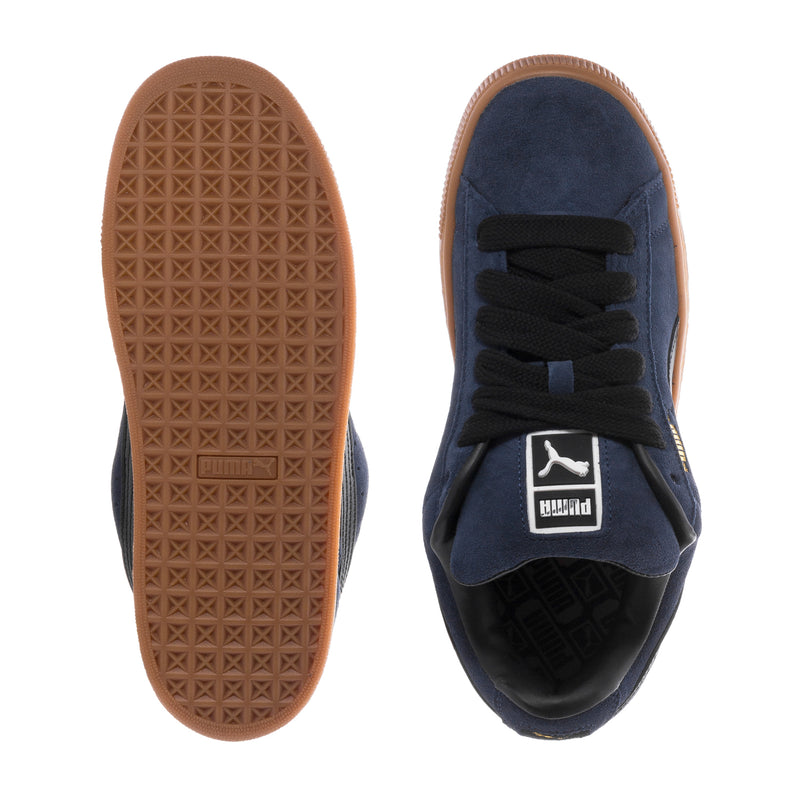 Men's navy suede sneakers with gum tread outsole and black lace panel