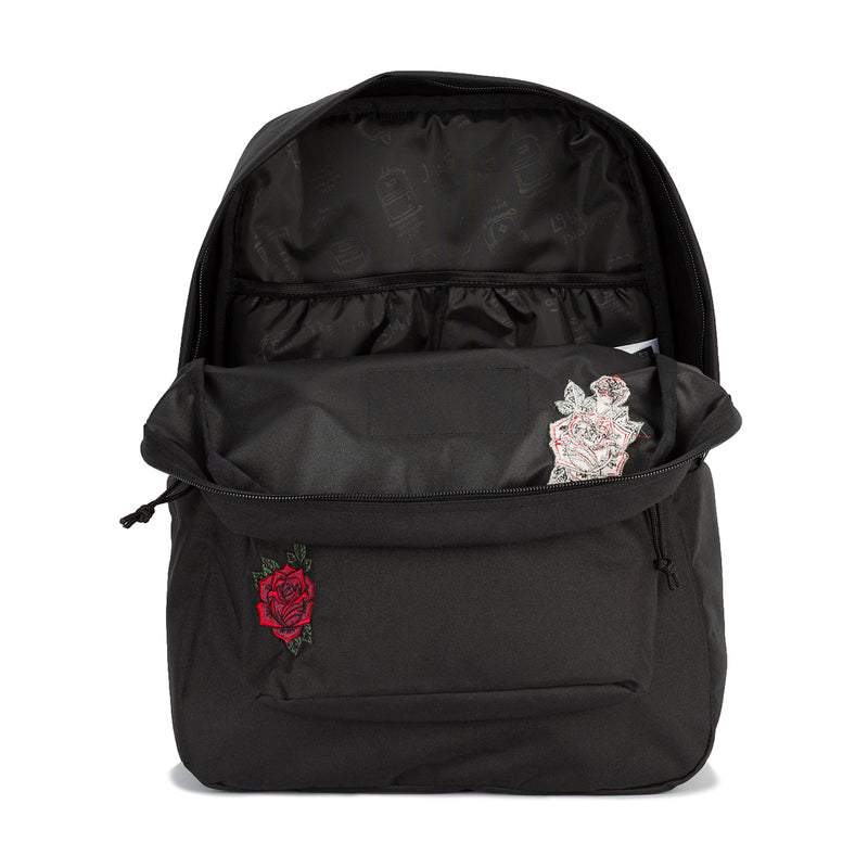 Black backpack back panel with rose embroidery and silver patch