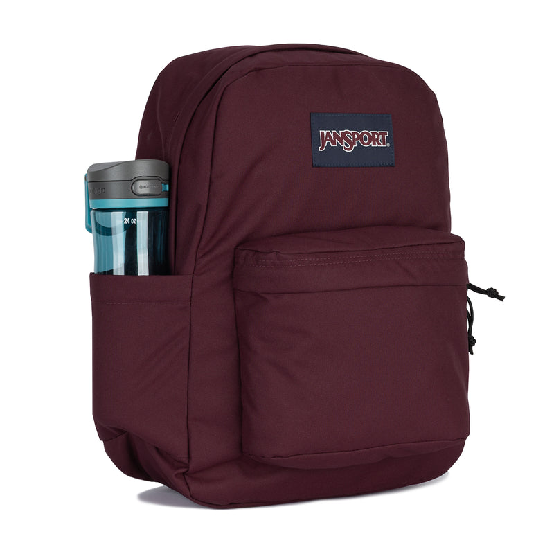 Maroon Jansport backpack with front pocket, side bottle holder, and logo patch