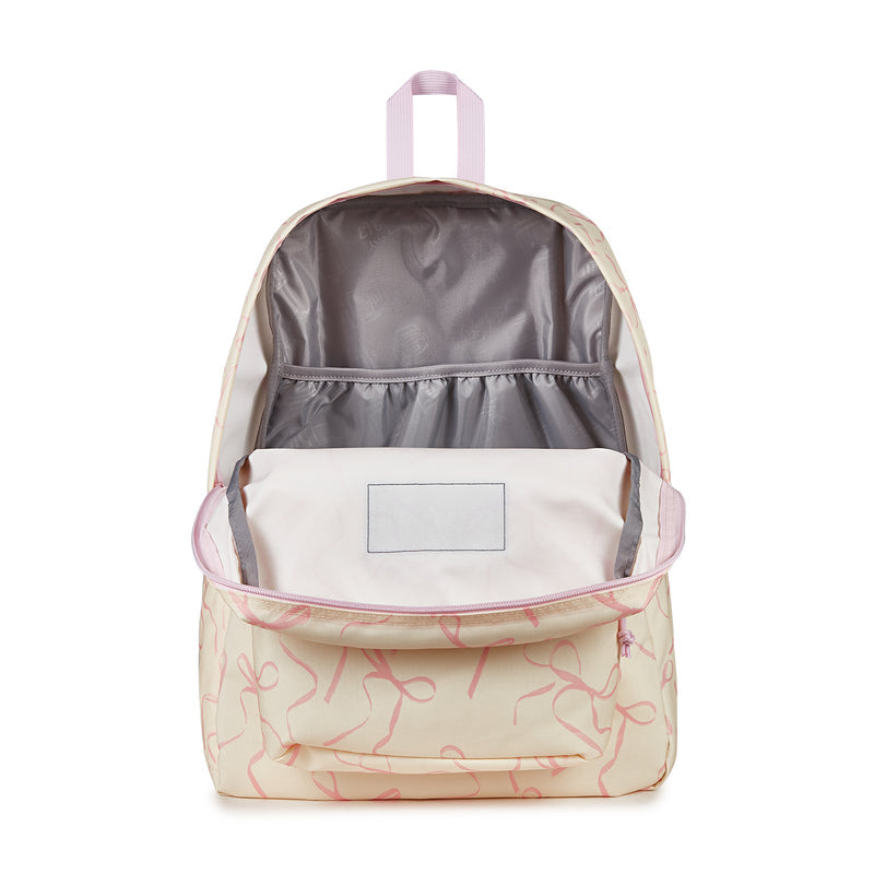 Cream backpack with pink doodle print, open top showing gray lining and inner pocket