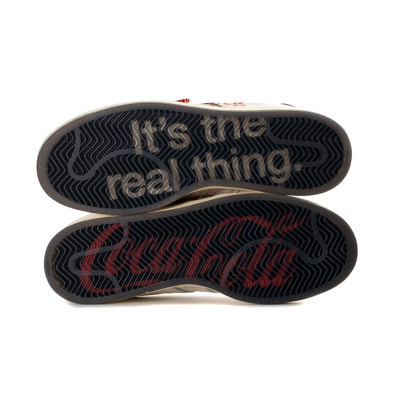 Men's Adidas Superstar II sneaker outsole, black rubber tread with red wave pattern