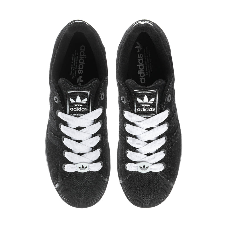 Black adidas sneakers with white laces and tongue logo, front view of both shoes