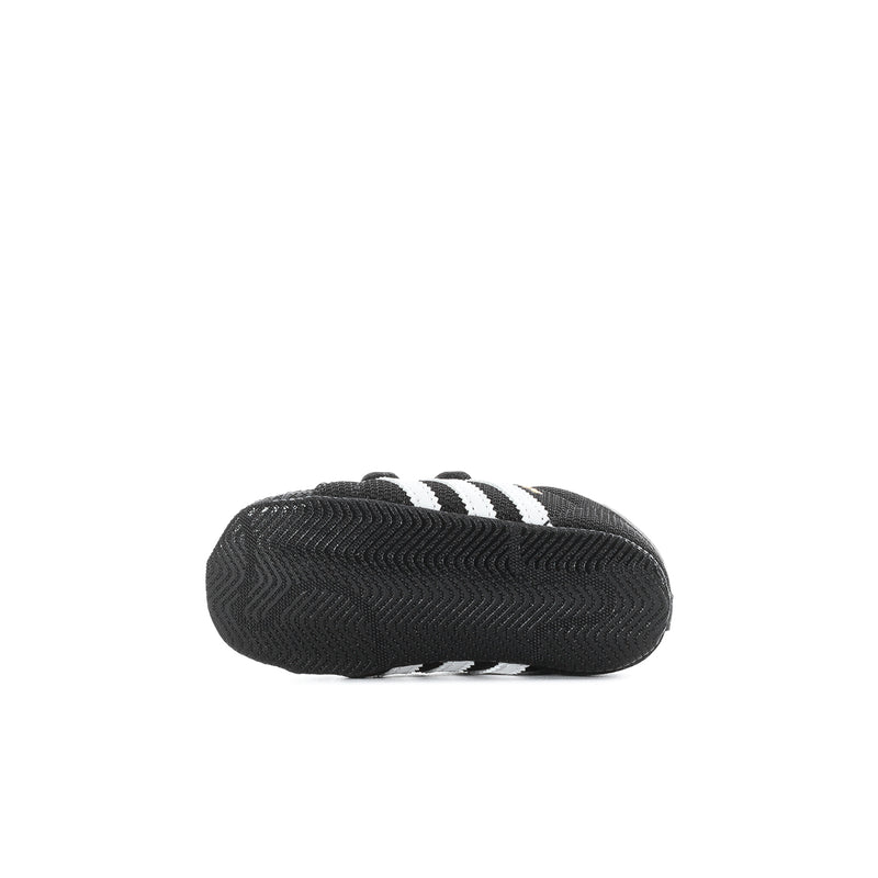 Infant black adidas Superstar sneaker sole with textured tread and three stripe detail