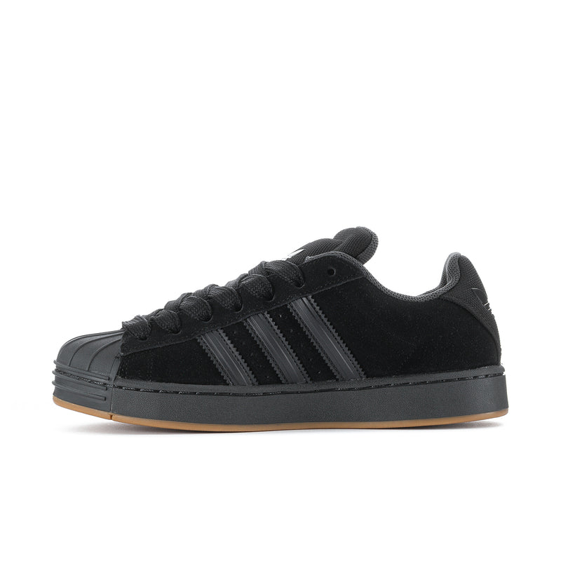 Superstar ST men's sneakers, side profile, black upper with three stripe details and gum outsole