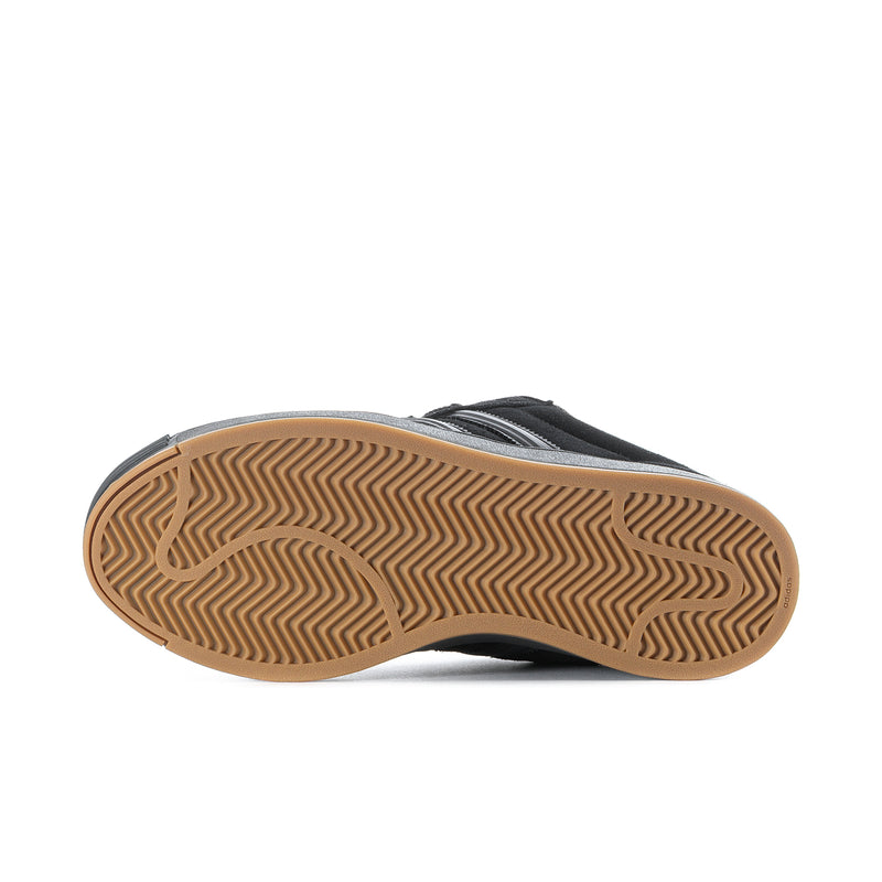 Superstar ST men's sneakers outsole view, treaded gum rubber bottom with black upper