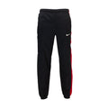 Men's black track pants with red side stripes and Nike logo