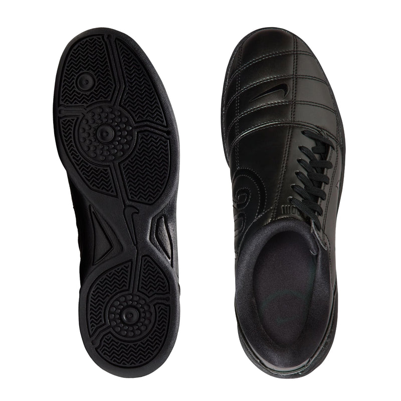 Women's T90 black sneaker outsole bottom and side profile, textured rubber tread.