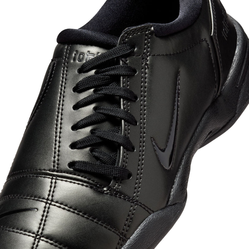 Women's T90 black leather sneakers, lace-up with Nike swoosh and stitched panels.