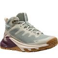 Multicolored athletic shoe with brand logo on a white background