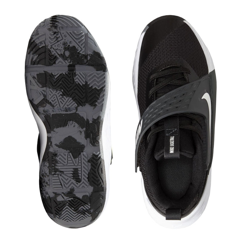 Kids Nike shoe bottom tread and black upper with white outsole