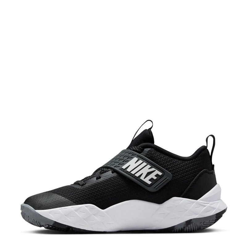Youth Nike slip-on sneaker with black mesh upper, white outsole, and NIKE logo strap