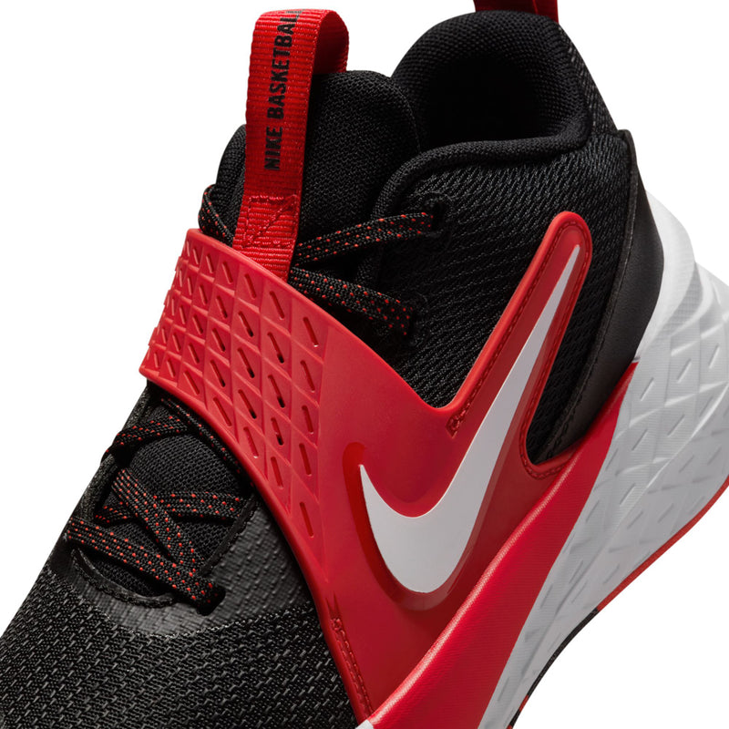 Youth high-top sneaker close-up, black upper with red collar strap and swoosh