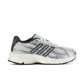 Women’s running shoes in chalk white and silver with black accents, lace-up