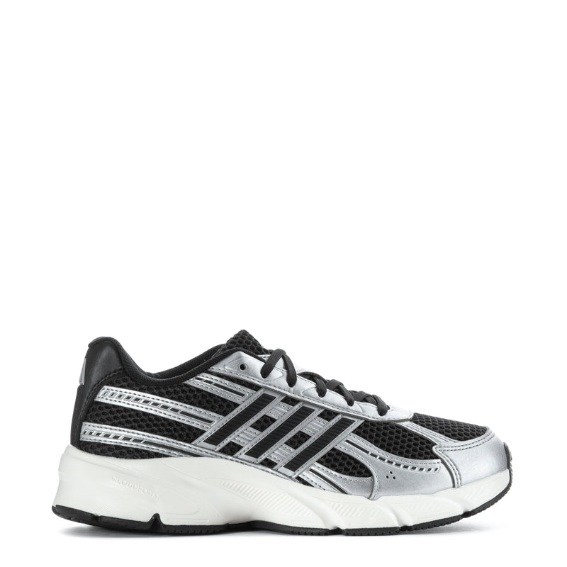 Black and silver lace-up low-top sneakers with mesh panels and cushioned white sole