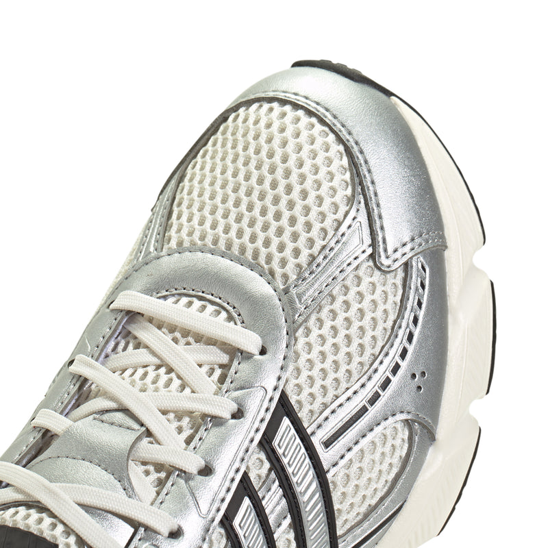 Women’s sneaker toe and lace area, silver perforated mesh and white laces
