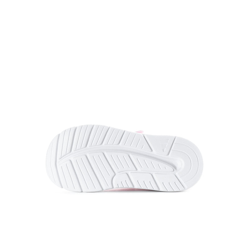 Toddler sneaker outsole, white tread pattern with subtle pink heel detail