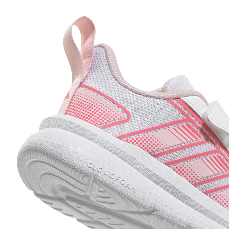 Toddler shoe side close-up, cushioned midsole with pink accent trims and collar