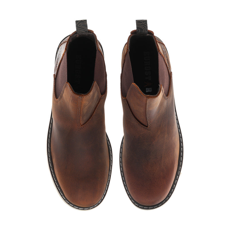 Women’s wide Chelsea boots showing inside lining and elastic gore in dark brown