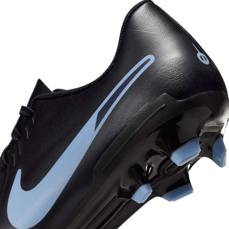 Men's black soccer cleat side close-up with light blue swoosh and stud outsole