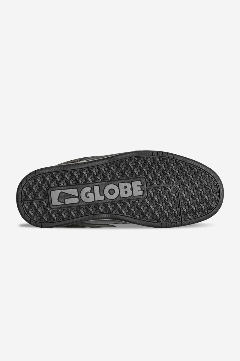Bottom view of Tilt skate shoe outsole with a detailed tread pattern and the Globe logo