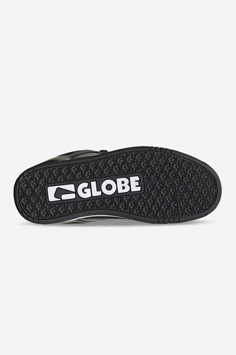 Bottom view of Tilt Prime shows the textured outsole with a prominent Globe logo