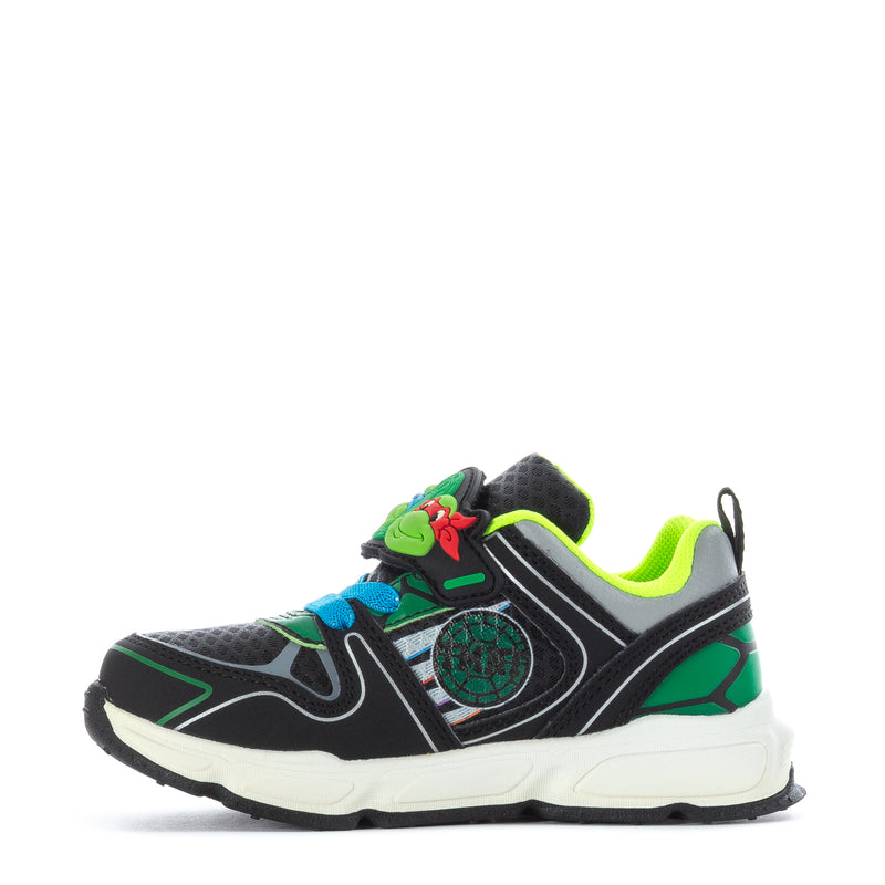 Toddler sneakers in black, green, and blue with TMNT character emblem