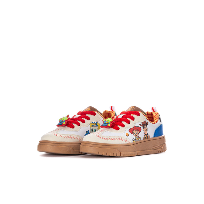 Kids low-top sneakers in white with red laces, colorful character print, tan sole