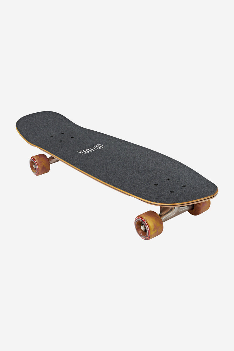Top-down view of Tracer Neue Cruiserboard 31 Explorer showing a black grip deck with natural edge and amber wheels
