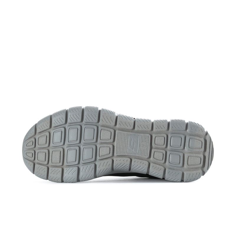 Men's wide black sneaker outsole with gray tread blocks for traction