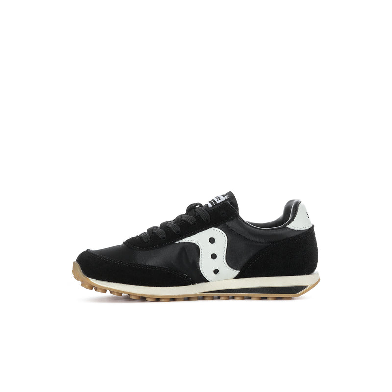 Kids black Saucony sneakers, angled side view, white side panel and gum sole