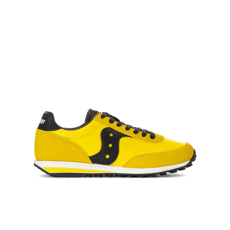 Youth lace-up running shoe in bright yellow with black side panels and rubber sole