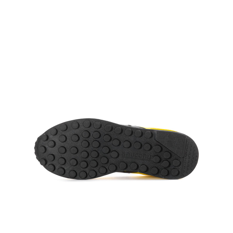 Youth shoe outsole, black rubber tread with yellow edge trim