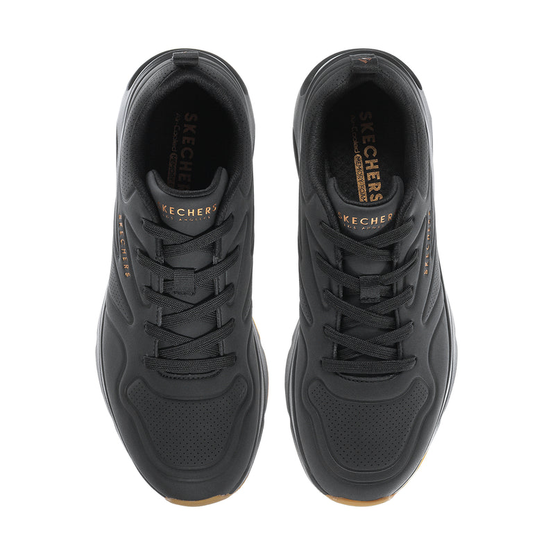 Pair of men's black lace-up sneakers with textured toe panels and Skechers logo