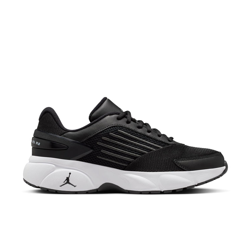 Women’s black running sneakers with ribbed side stripes and white midsole