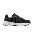 Women’s black running sneakers with ribbed side stripes and white midsole