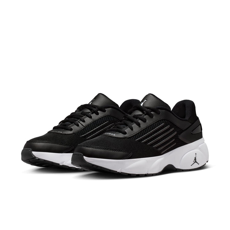 Pair of women’s black running sneakers with lace-up front and white outsole