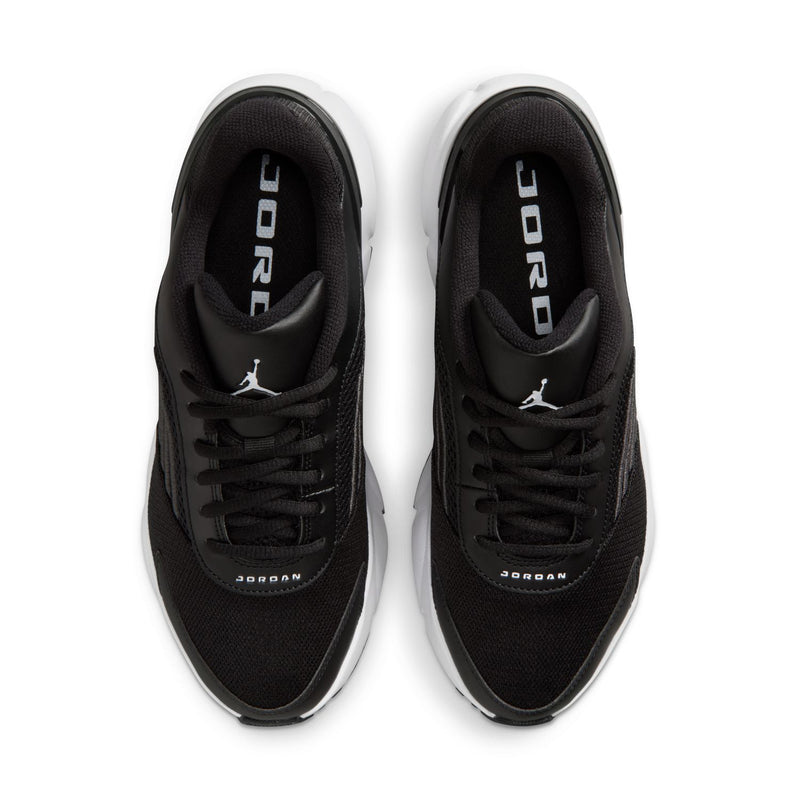 Women’s black sneakers with padded collar and “JORDAN” text on inner tongue