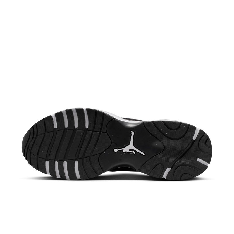 Black rubber outsole with striped traction tread and center Jordan logo