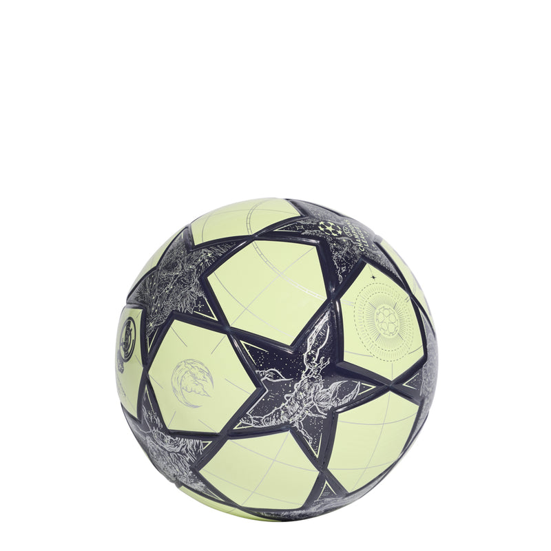 Lime and dark navy mini football with geometric panels and Real Madrid crest patch.