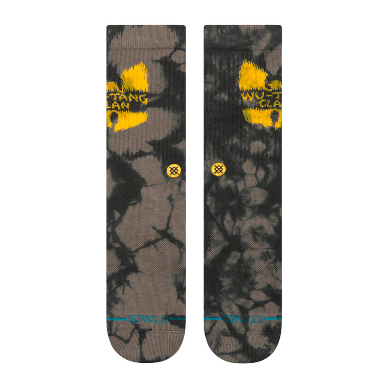 Pair of crew socks with dark camo pattern, yellow top logo, small cross emblem