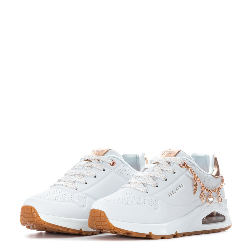 Pair of kids' white sneakers with rose-gold chain detail and lace-up front