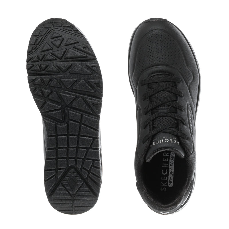 Black SKECHERS sneaker outsole tread and heel view with lace-up upper