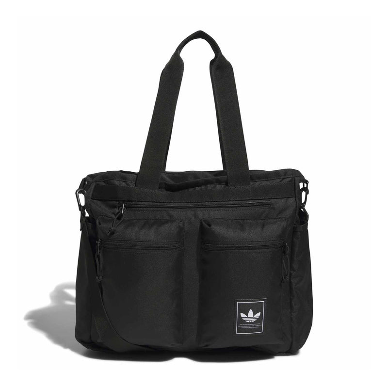 Black utility tote bag with top handles, zip closure, front organizer pockets, logo patch.