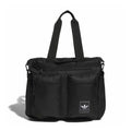 Black utility tote bag with top handles, zip closure, front organizer pockets, logo patch.