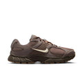 Men's running shoes in mink brown with mesh upper, padded collar, and dark rubber sole