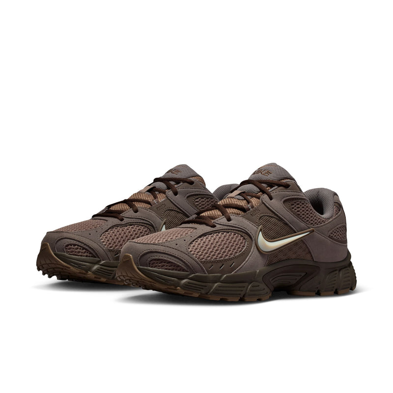 Men's running shoes, mink brown with brown laces, swoosh accents, and chunky tread outsole