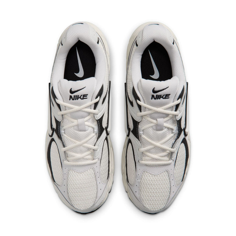 Pair of men's running shoes, light gray uppers with black swooshes and white laces