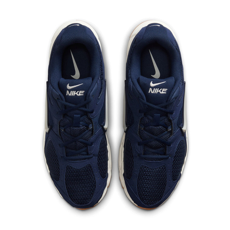 Men's navy sneakers with Nike logo on tongue and laces